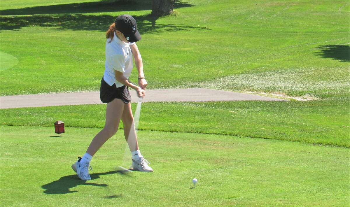 Manistee junior Kendal Waligorski tees off on the first hole at Manistee Golf and Country club during the Chippewas match against Kalkaska on Aug. 17.