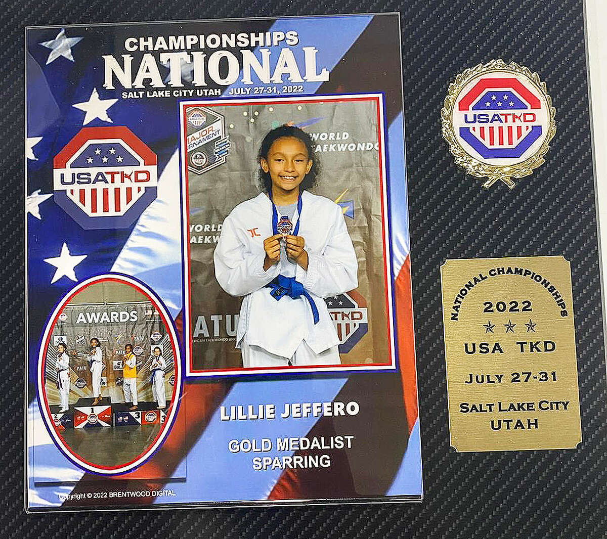 Lillie winning the national title in Olympic sparring -35kg blue belt female youth category in Salt Lake City, Utah recently. The 9-year-old has only been in taekwondo for a little more than a year.