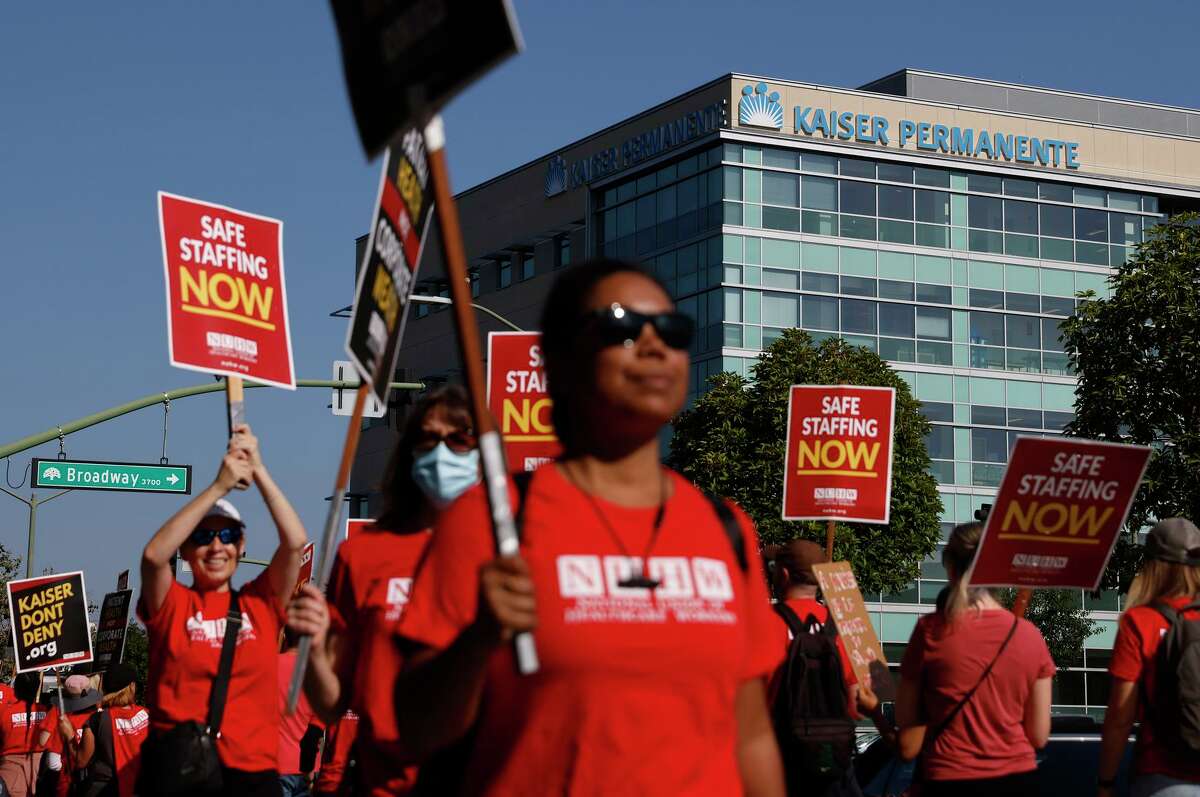 Striking Kaiser mental health care workers say they’re overworked in a U.S. health system that is overburdened.
