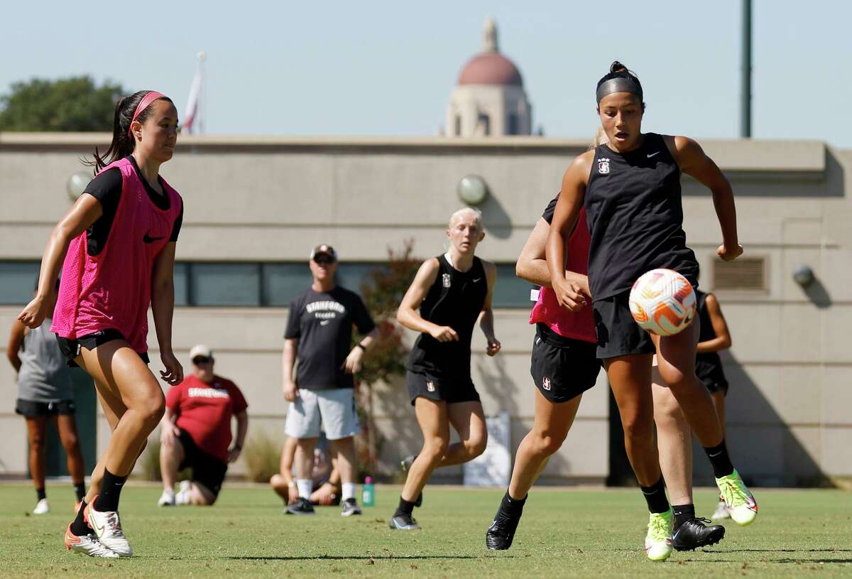 Stanford's Maya Doms (10), right, runs drills during soccer practice at the Maloney Field on the campus at Stanford, Calif., on Tuesday, August 16, 2022.