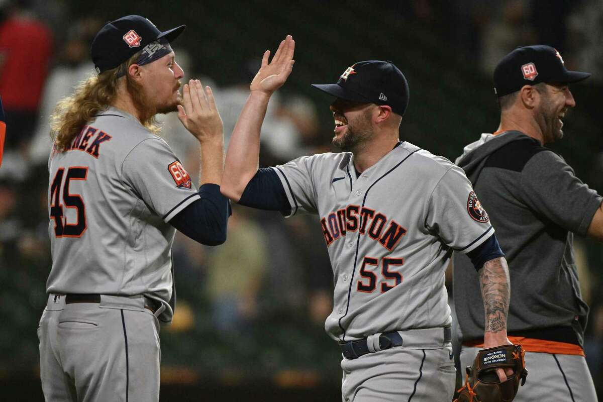 Ryne Stanek (left) and Ryan Pressly recorded the final six outs to secure an Astros victory Wednesday after late-inning blown leads the previous two nights against the White Sox.
