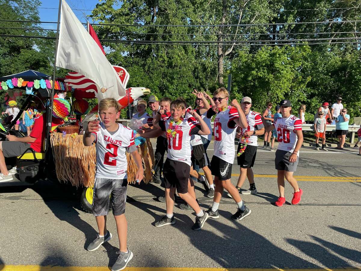 Eagles football takes part in Cheeseburger Parade of Fools