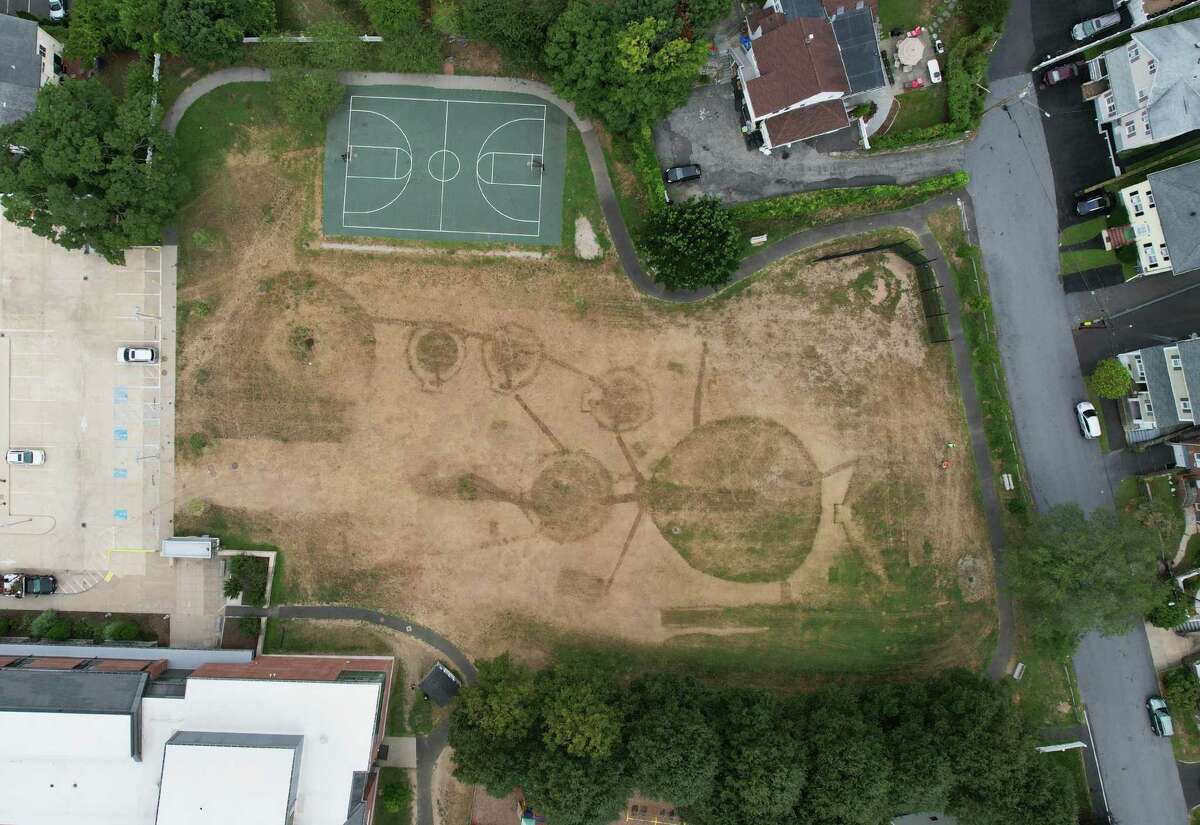 The Hamilton Avenue School fields are damaged after the St. Roch’s Feast over the weekend.