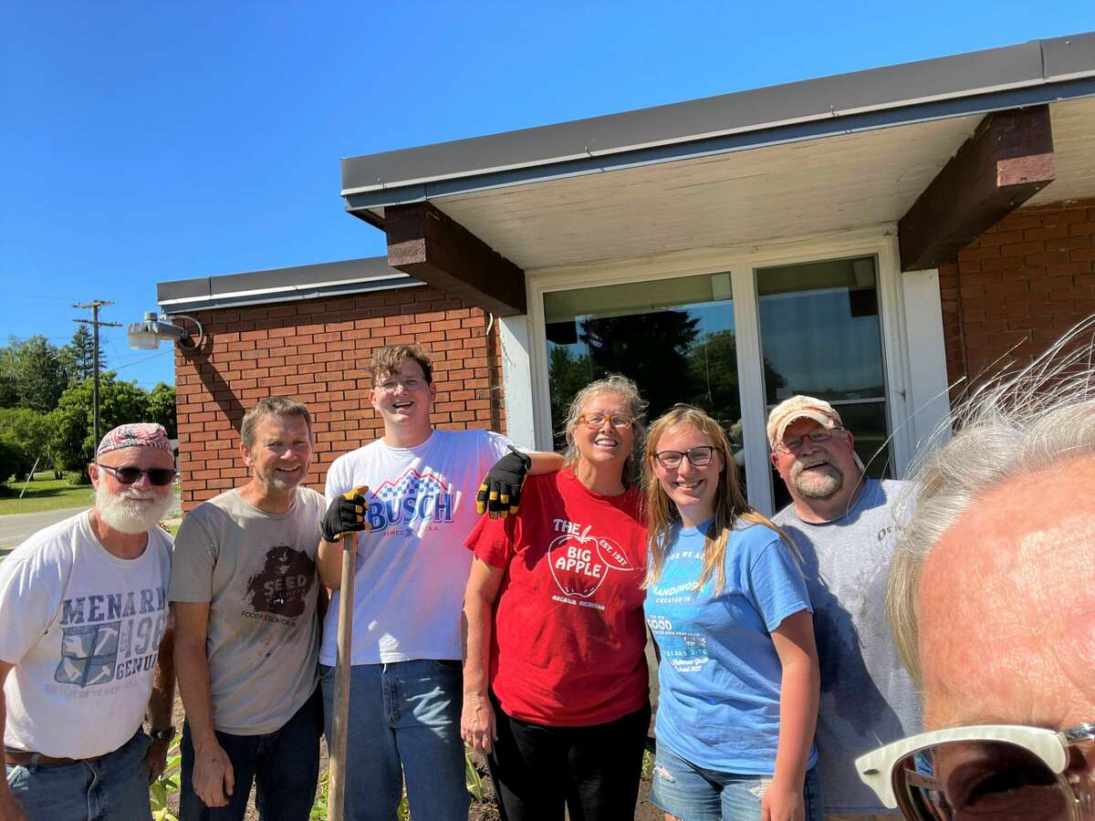 Several volunteers planted flowers for the Monarch Waystation at Pleasant Valley Community Center in Arcadia, including (left to right) Roger Brown, Mark Banaszak, Eric Webster, Kristina Stierholz, Greta Bradford, Roger Anderson and Gretchen Stierholz.