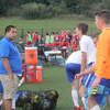 Chippewa Hills soccer coach Jay Franks (left) talks to his players after a match against Big Rapids last season. There's not enough players for a boys team at Chippewa Hills this fall.