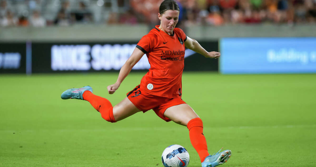 Houston Dash midfielder Haley Hanson (9) shoots on goal in the second half during the NWSL soccer match between the Kansas City Current and Houston Dash at PNC Stadium in Houston,Texas.