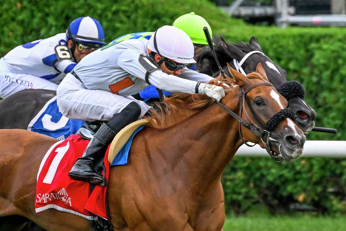 Golden Rocket, ridden by jockey Jose Gomez, rockets past the competition to win the 20th running of the New York Stallion Series' Statue of Liberty Division at Saratoga Race Course on Wednesday, Aug. 17, 2022.