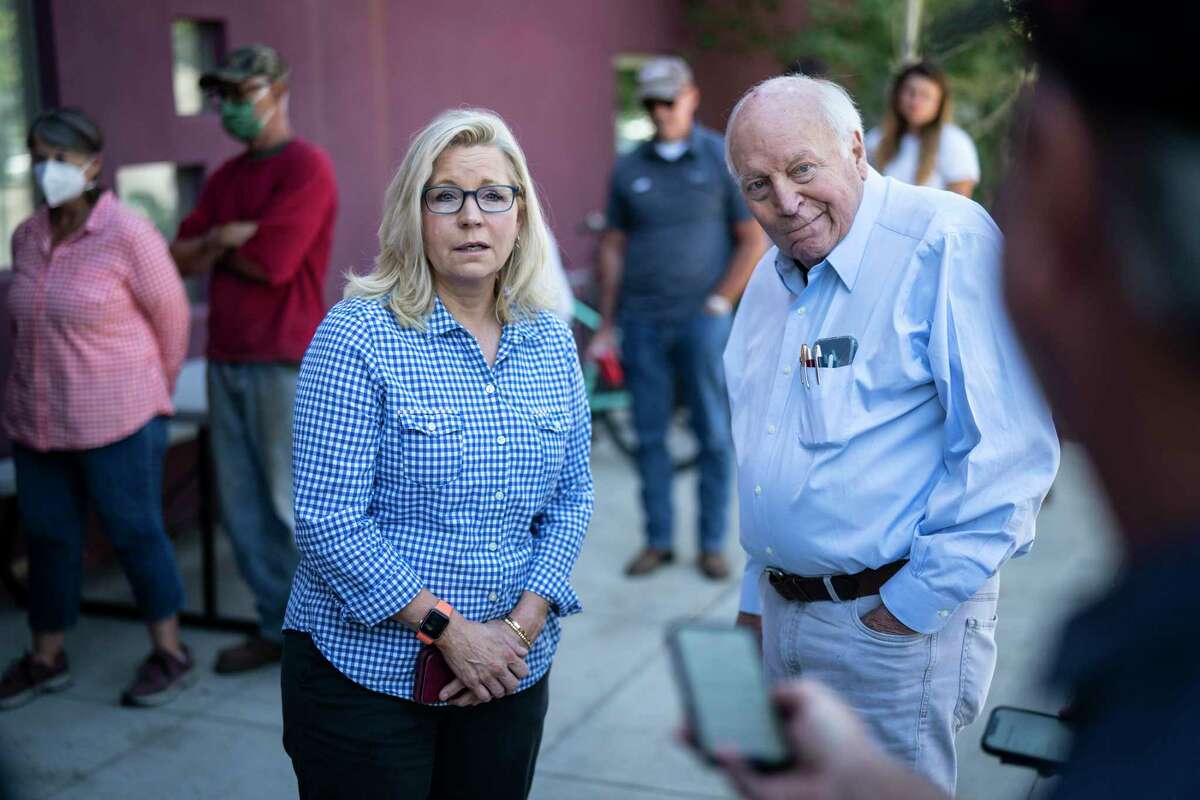 Rep. Liz Cheney with her father, former Vice President Dick Cheney, at a polling station. The Wyoming congresswoman, who has criticized Donald Trump, lost her primary election Tuesday.