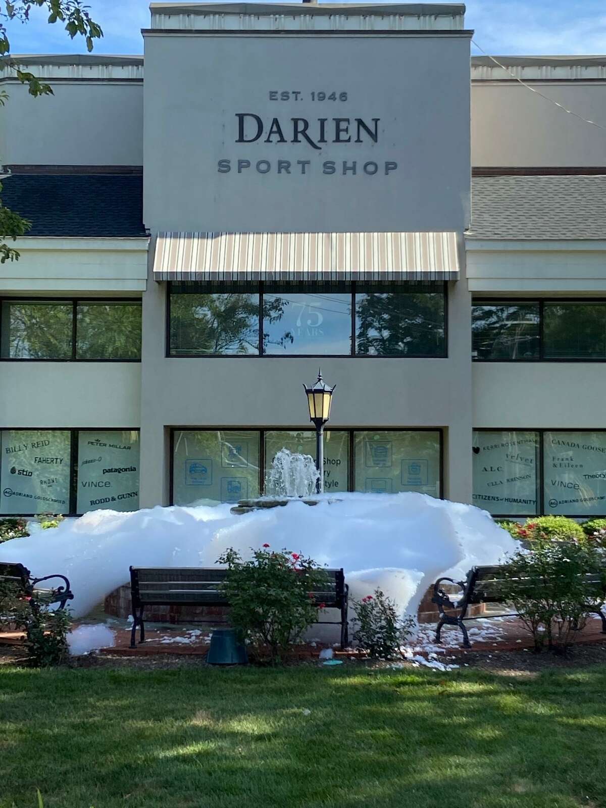 A fountain on Post Road in Darien was overflowing with bubbles and suds Sunday after pranksters put soap in the water feature, police said.