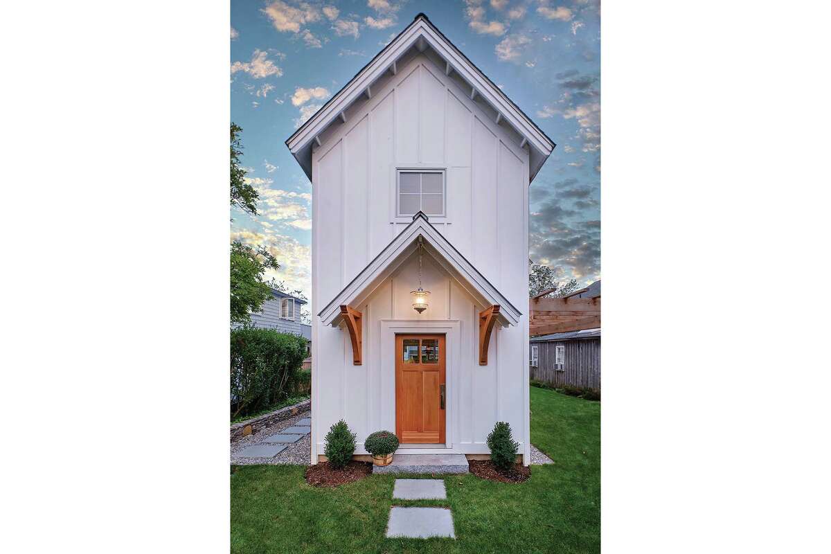 Despite a narrow footprint, this Branford home is packed with comfortable features.