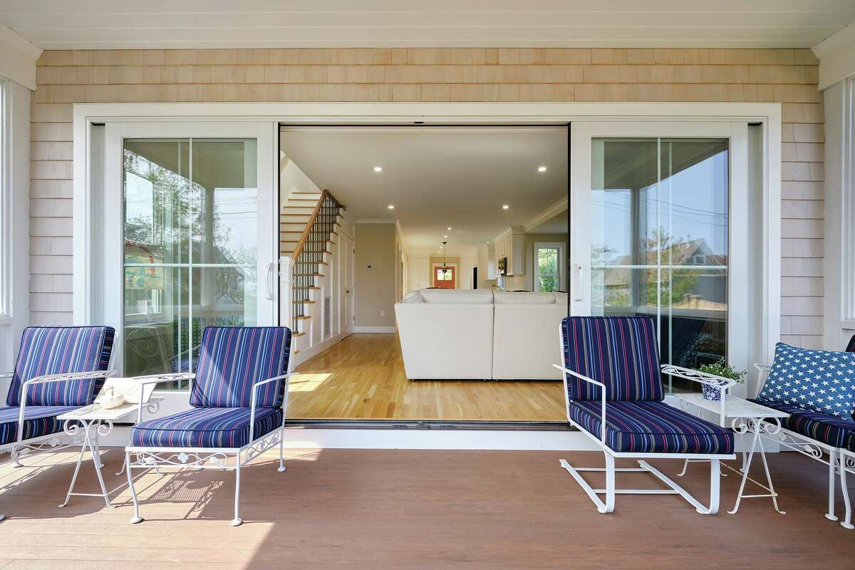 The screened porch doesn't technically count toward the home's living area, but it's an expansive and welcome aspect in the summer (and beyond).