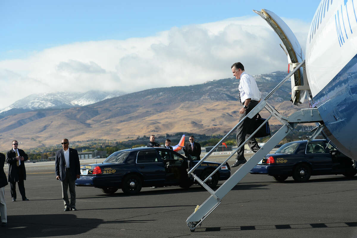 Former Republican presidential candidate Mitt Romney arrives at Reno-Tahoe International Airport in October 2012.