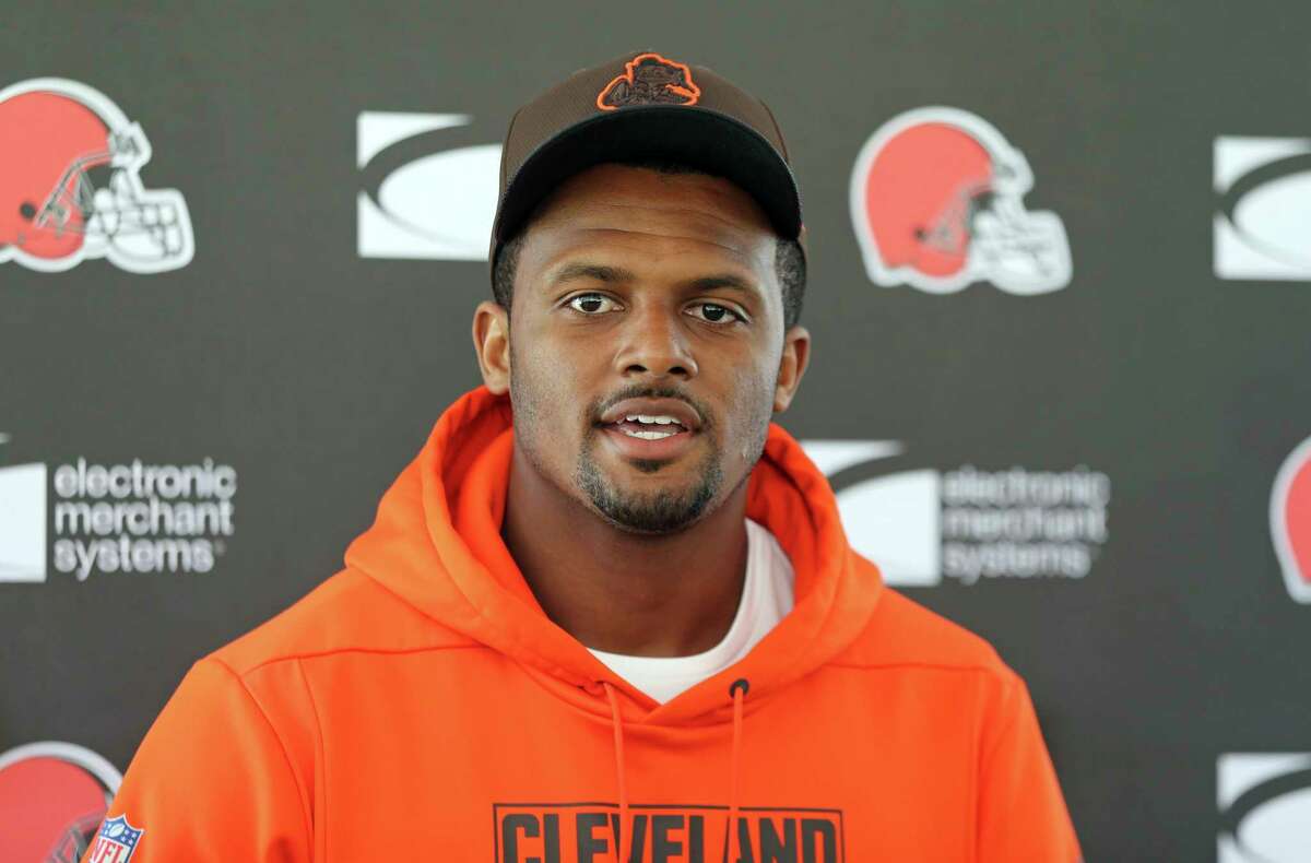 Cleveland Browns quarterback Deshaun Watson speaks to the media, Thursday, Aug. 18, 2022, in Berea, Ohio, after the team announced that Watson has reached a settlement with the NFL and will serve an 11-game unpaid suspension and pay a $5 million fine rather than risk missing his first season as quarterback of the Cleveland Browns following accusations of sexual assault while he played for the Houston Texans.
