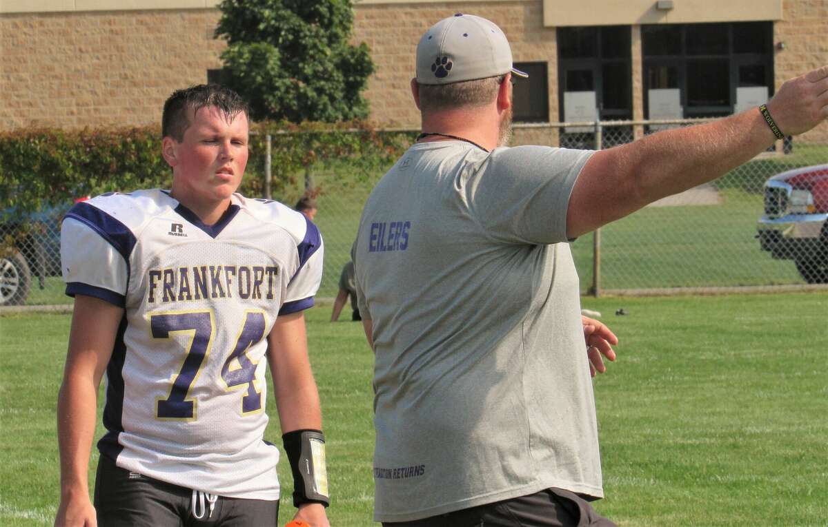 Frankfort sophomore Nolan Clouse gets coached up during a scrimmage on Aug. 19