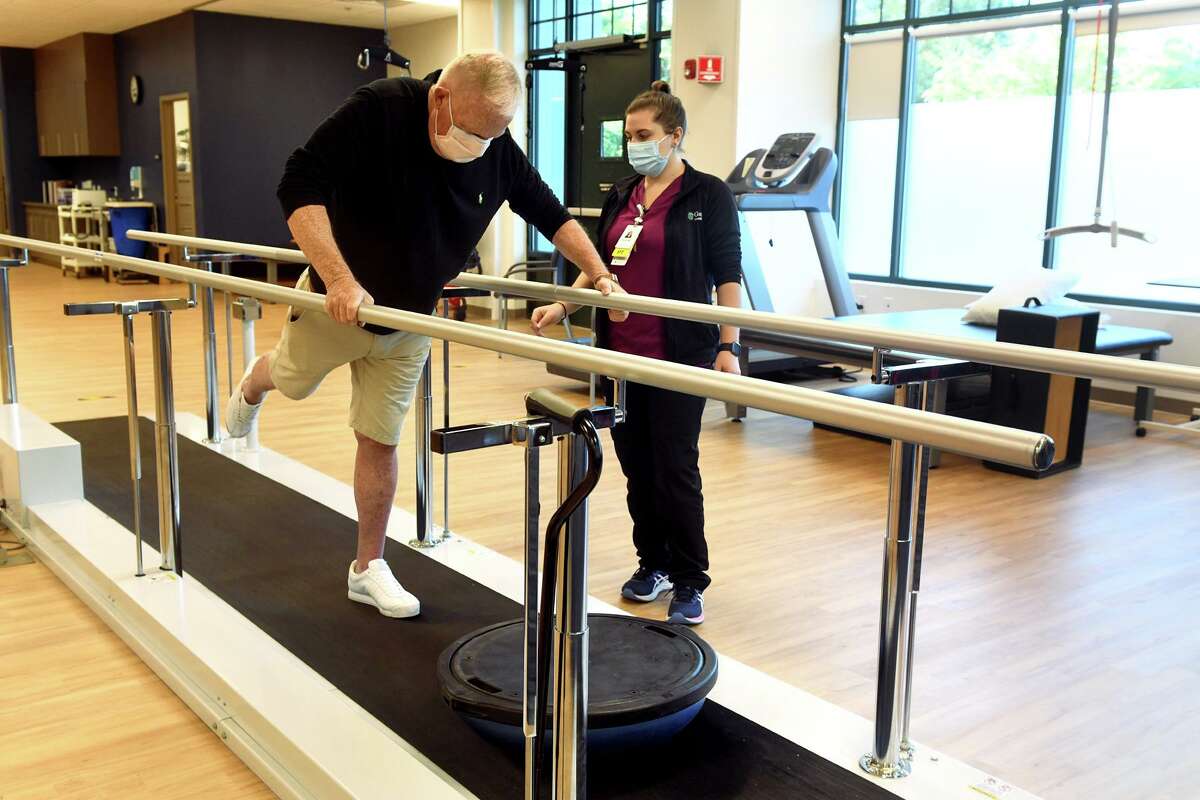 North Branford man walks again after refusing to accept paralysis