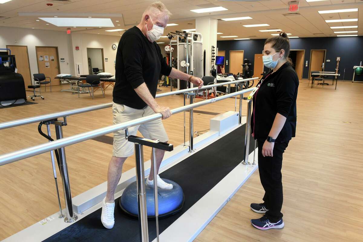 North Branford man walks again after refusing to accept paralysis