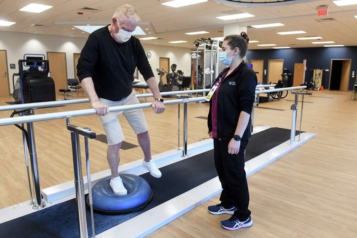 North Branford man walks again after refusing to accept paralysis