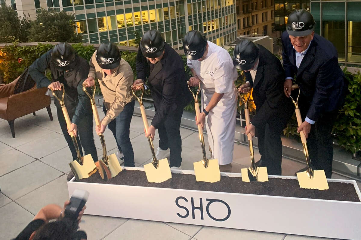 Sho Group CEO Joshua Sigel (third from the left), chef Shotaro “Sho” Kamio (to the right of Sigel), and others pose for a photo on Aug. 18, 2022.