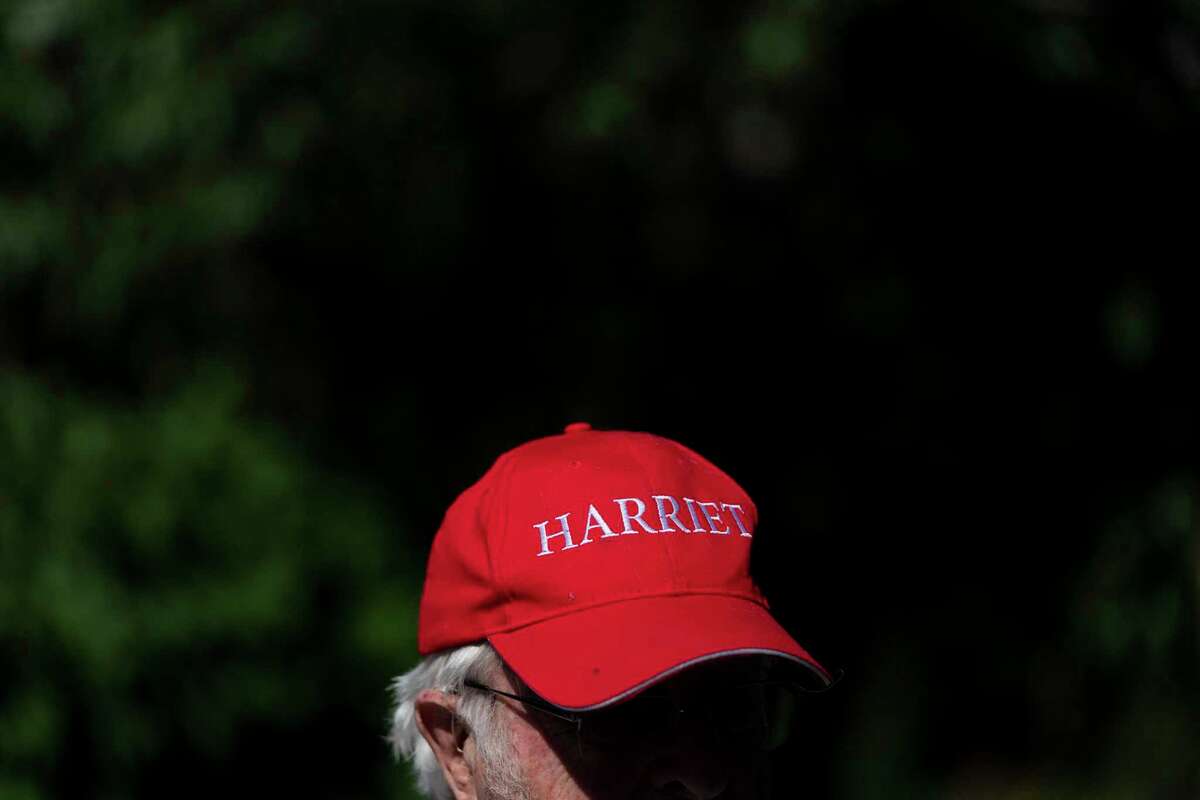 Horton Spitzer, a supporter of Republican U.S. House candidate Harriet Hageman, talks to reporters outside a polling place during the Republican primary election in Wilson, Wyo., Tuesday, Aug. 16, 2022. Rep. Liz Cheney, a leader in the Republican resistance to former President Donald Trump, lost her seat in the U.S. House as voters weighed in on the direction of the GOP. (AP Photo/Jae C. Hong)