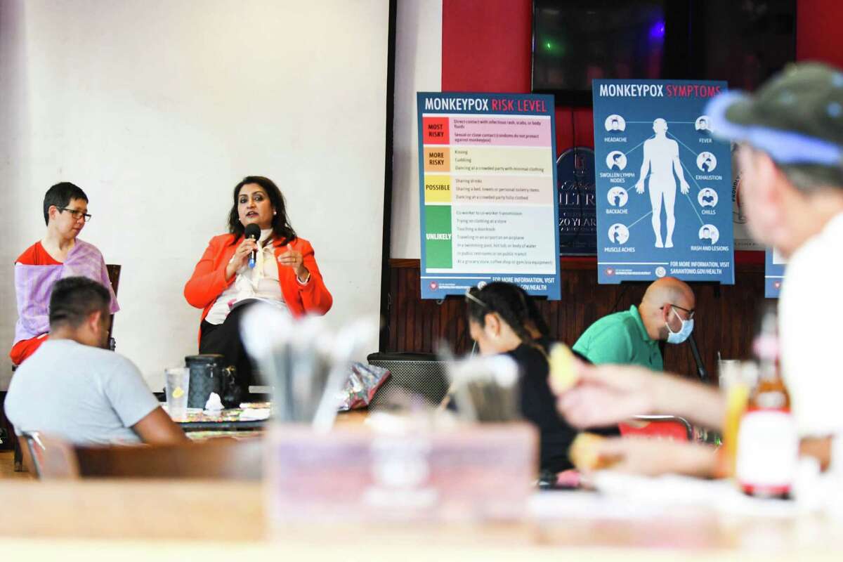 M.D Junda Woo and Ph.D Anita K Kurian speak during a Metro Health Question and answers session on monkeypox at Luther’s Cafe on Aug. 19, 2022