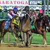 Leader of the Band #4 with jockey John Velazquez leads the way to the win in the 9th running of The Summer Colony at the Saratoga Race Course Wednesday Aug, 17 2022 in Saratoga Springs N.Y. Photo Special to the Times Union by Skip Dickstein