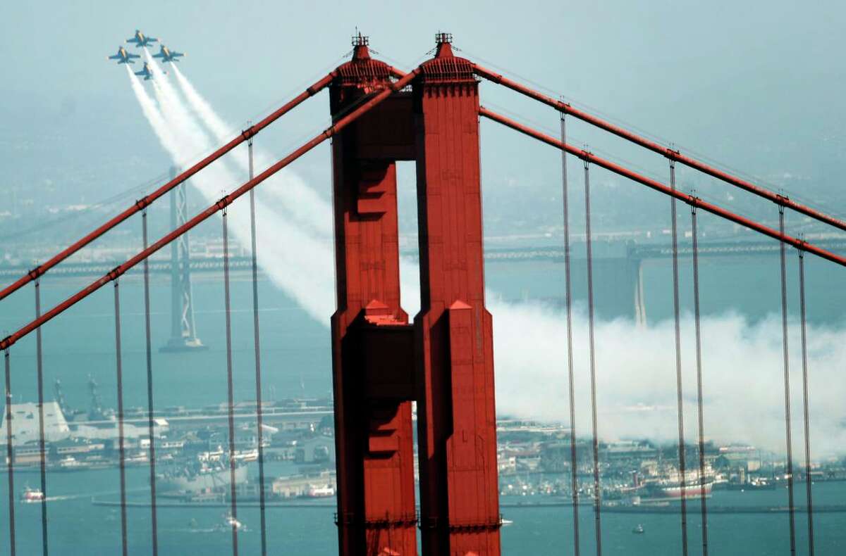 The Blue Angels practice for their Fleet Week show above San Francisco Bay in 2021. Sound waves created by the Navy fighter jets bother many dogs.