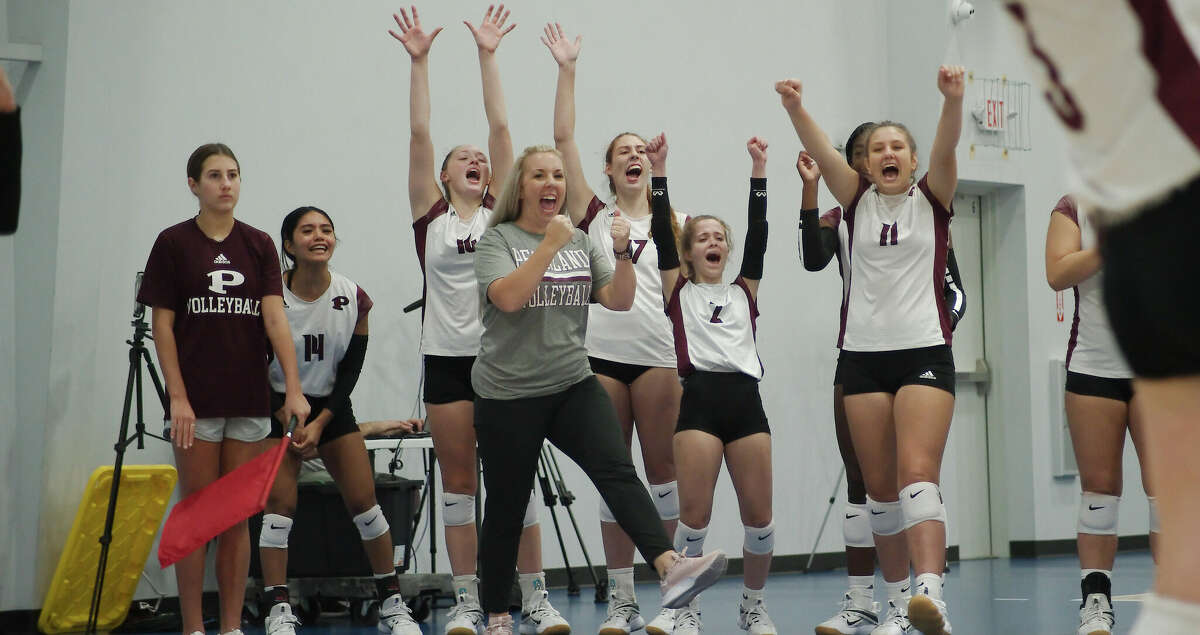 Pearland celebrates a point against Crosby Thursday, Aug. 11, 2022 during the John Turner Classic Volleyball Tournament at Absolute Volleyball Academy.