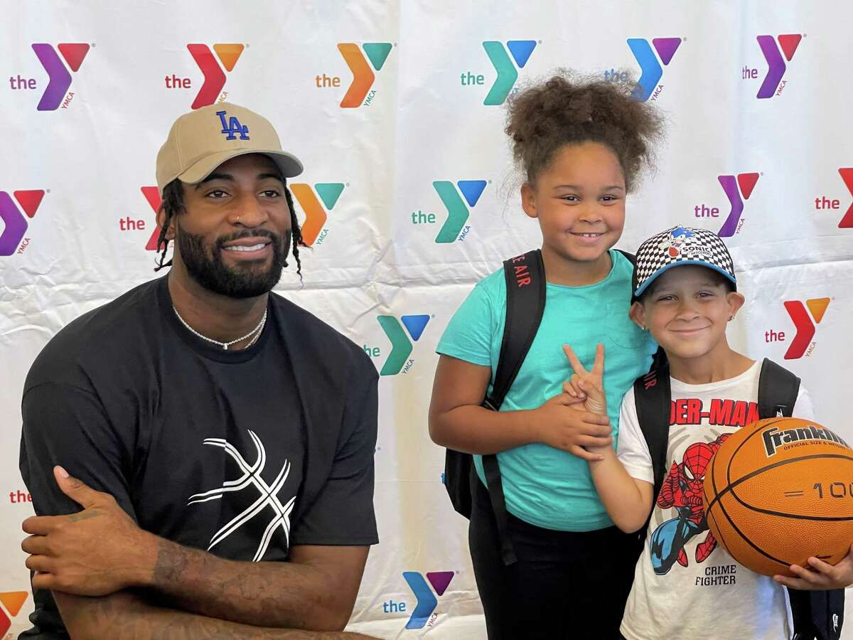Andre Drummond of Middletown returned to the Middlesex YMCA Saturday to greet children and hand out school supplies. Drummond, who played a season at UConn and is 11 years into his NBA career, spent much of his youth at the Y.