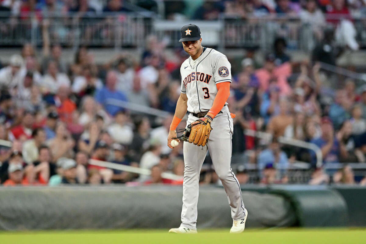 ATLANTA, GA - AUGUST 20: Jeremy Pena #3 of the Houston Astros reacts after mishandling a ground ball against the Atlanta Braves during the fourth inning at Truist Park on August 20, 2022 in Atlanta, Georgia. (Photo by Adam Hagy/Getty Images)