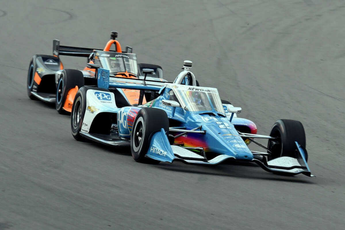 Josef Newgarden (2) enters Turn 1 during Saturday's IndyCar race at World Wide Technology Raceway in Madison.