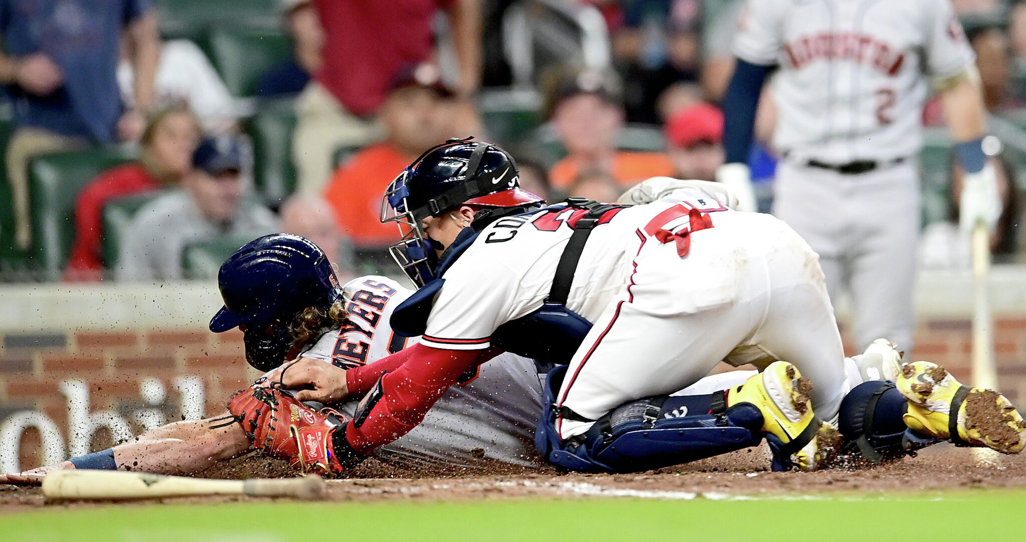 Olson's check-swing double in 11th helps Braves top Astros