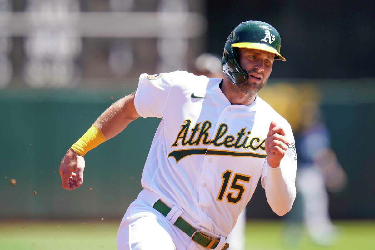 Jordan Diaz of the Oakland Athletics looks on from the dugout