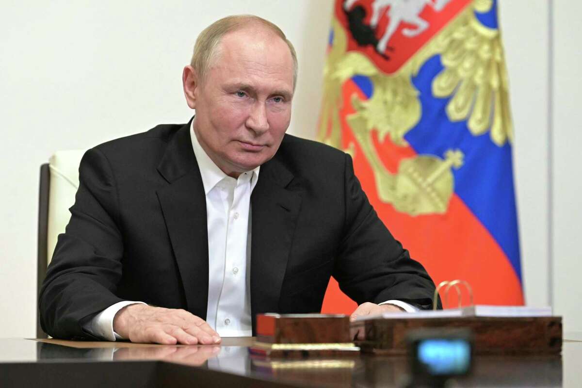 Russian President Vladimir Putin addresses participants and guests of the 4th Tavrida ART festival via a video link at the Novo-Ogaryovo state residence, outside Moscow, Russia, Aug. 15, 2022.