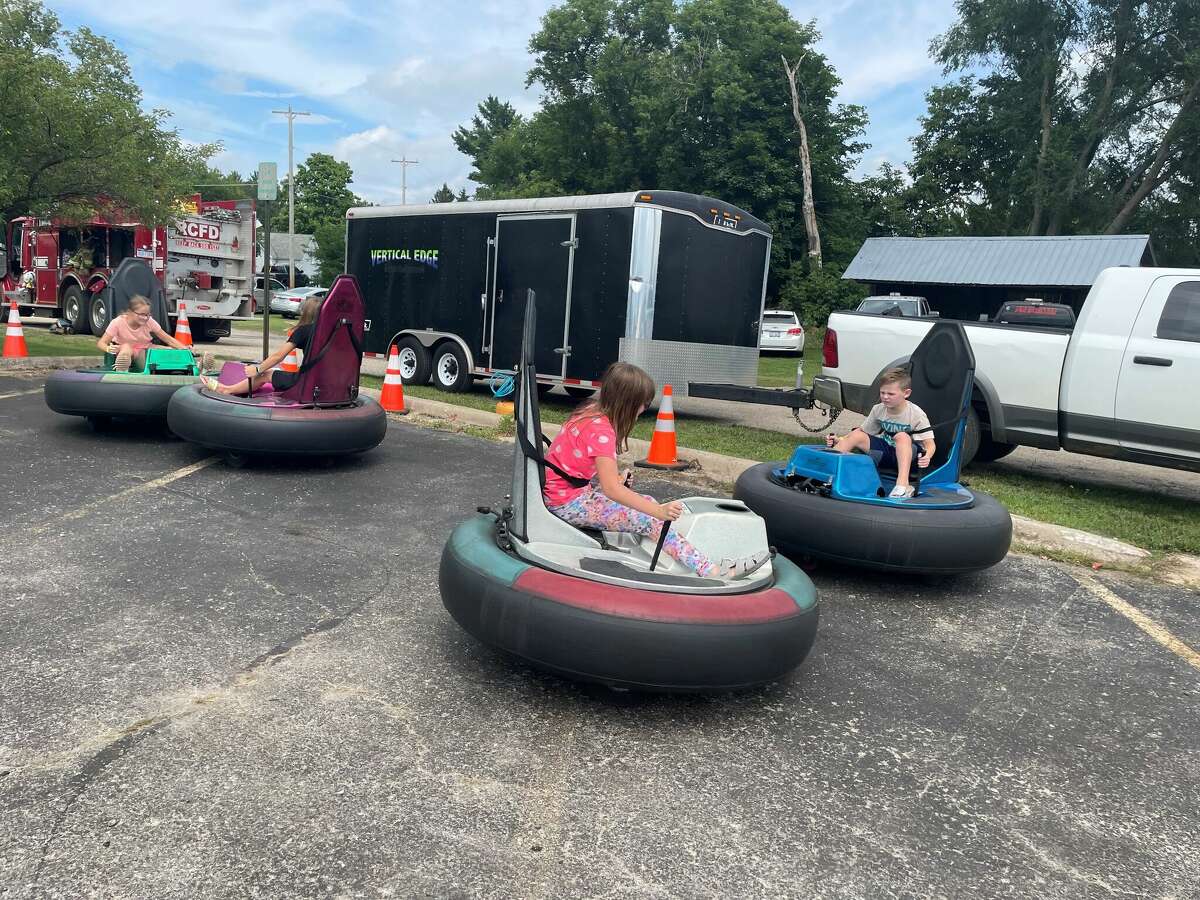 The Great American Crossroads Celebration drew hundreds to the Reed City area for a carnival and cornhole tournament on Saturday.