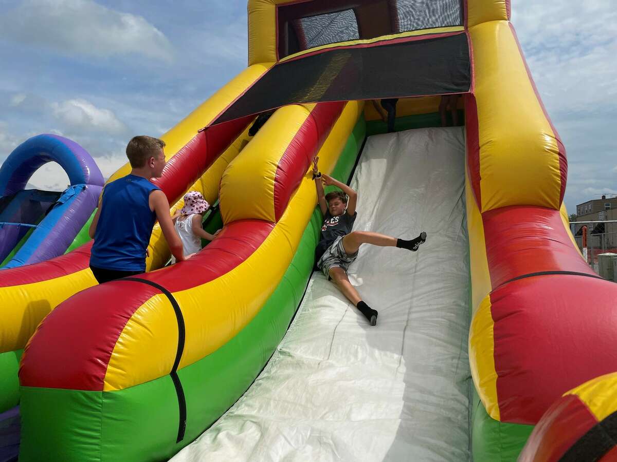 The Great American Crossroads Celebration drew hundreds to the Reed City area for a carnival and cornhole tournament on Saturday.