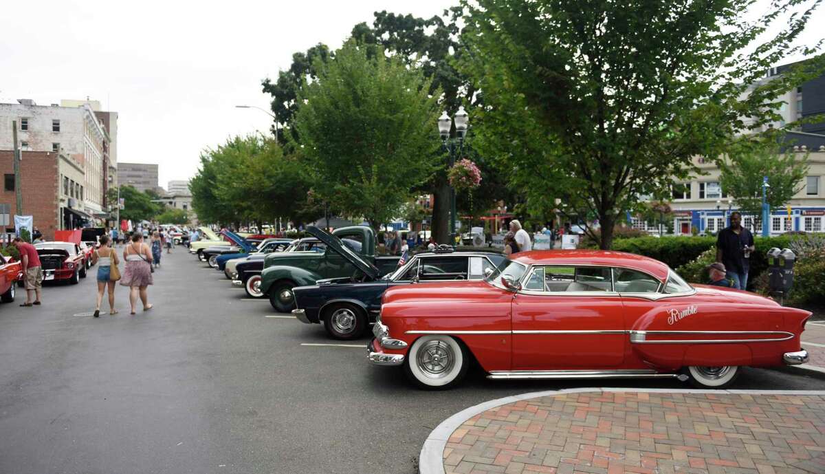 Classic cars are on display at the Cruising Stamford Auto Show at Columbus Park in Stamford, Conn.  Sunday, August 21, 2022. More than 150 vintage cars up to the early 80s are displayed on Main Street, with live music, outdoor dining, face painting, prizes and more.  The event, now in its second year, was presented by First Bank of Greenwich, Synergy1Holdings and BlackRoads Auto Club to honor Eversource Energy and the US Postal Service.