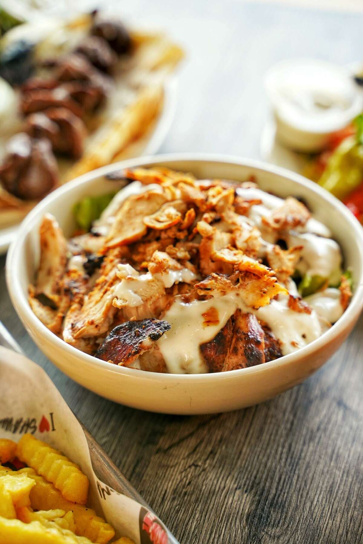 Popular Abu Omar Halal food truck expands to Spring