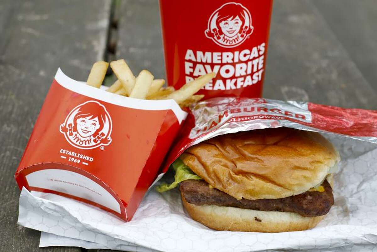 FILE - In this May 5, 2020, file photo, Wendy's restaurant Dave's Combo cheeseburger meal is displayed in Pittsburgh.