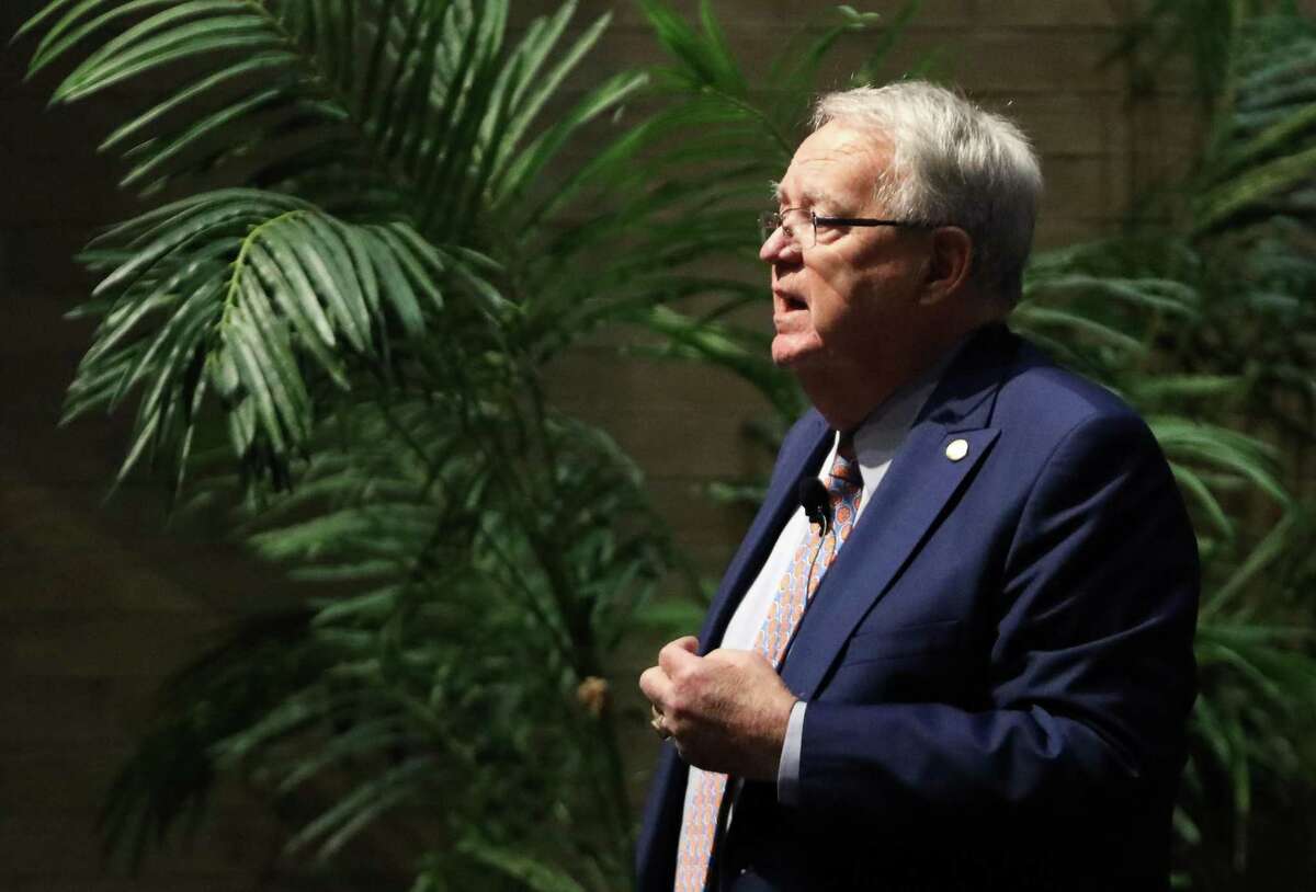 Dr. Ben Raimer, interim president of the University of Texas Medical Branch at Galveston, answers a question from the audience during a town hall on the COVID-19 virus Friday, March 6, 2020. The town hall was held to answer questions and alleviate concerns about the COVID-19 virus.