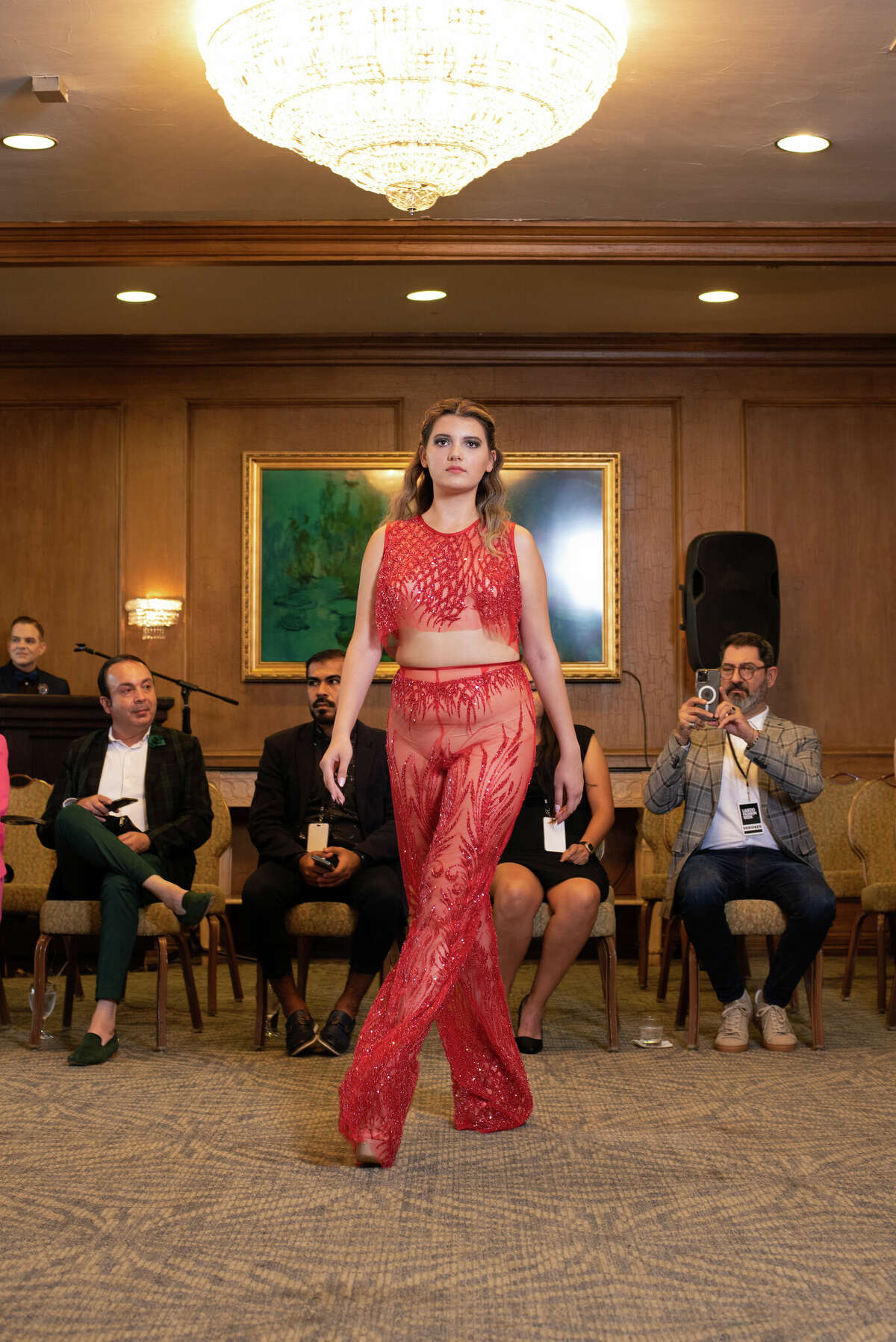 Model walking runway at Laredo Country Club Friday, Aug. 19, 2022 for the Laredo Fashion Week Kick-Off Cocktail Event for the designers.