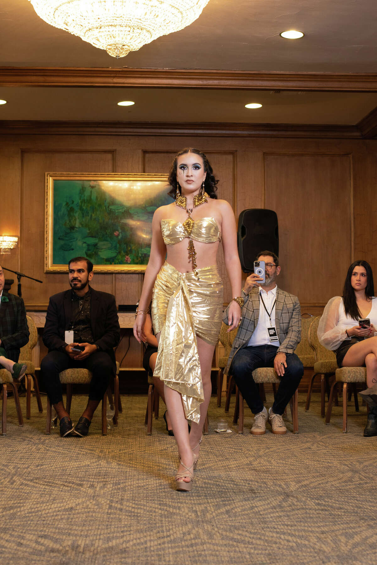 Model walking runway at Laredo Country Club Friday, Aug. 19, 2022 for the Laredo Fashion Week Kick-Off Cocktail Event for the designers.