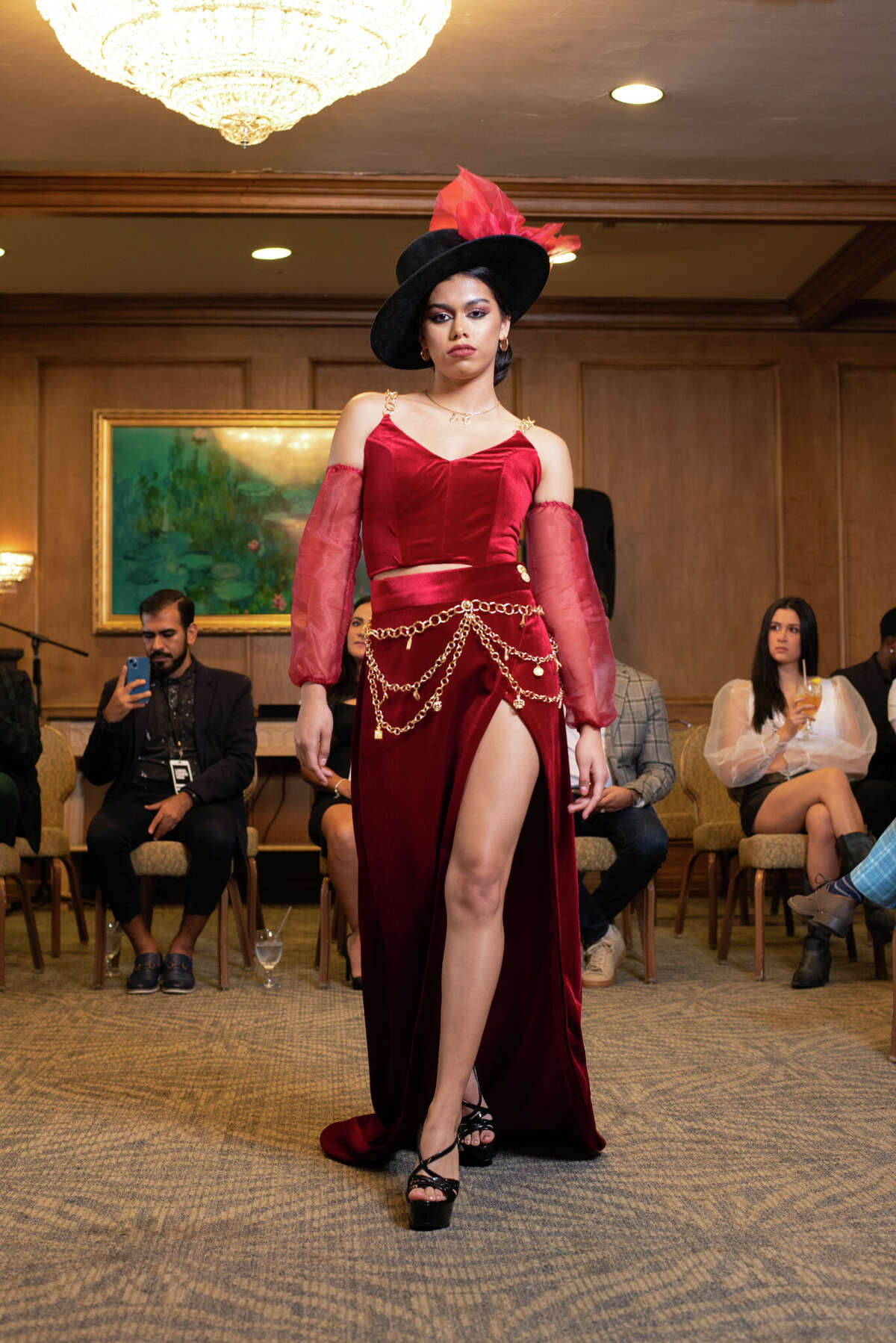 Model walking runway at Laredo Country Club Friday, Aug. 19, 2022 for the Laredo Fashion Week Kick-Off Cocktail Event for the designers.