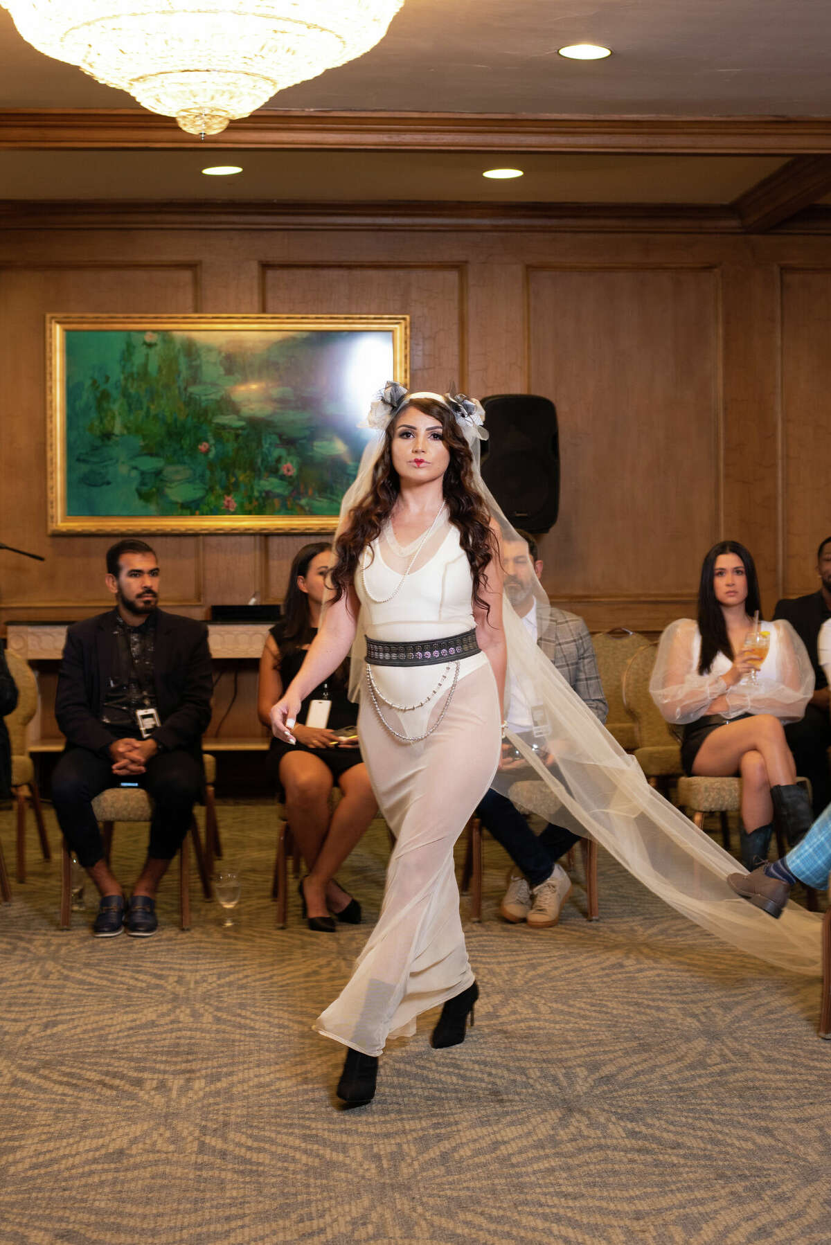 Model walking runway at Laredo Country Club Friday, Aug. 19, 2022 for the Laredo Fashion Week Kick-Off Cocktail Event for the designers.