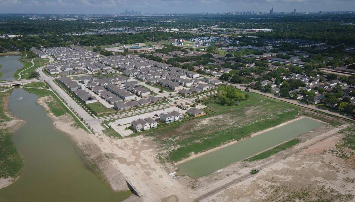 Spring Brook Village, a master-planned community, is built several feet higher than the surrounding neighborhoods. It was photographed Sunday, Aug. 21, 2022, in Houston.