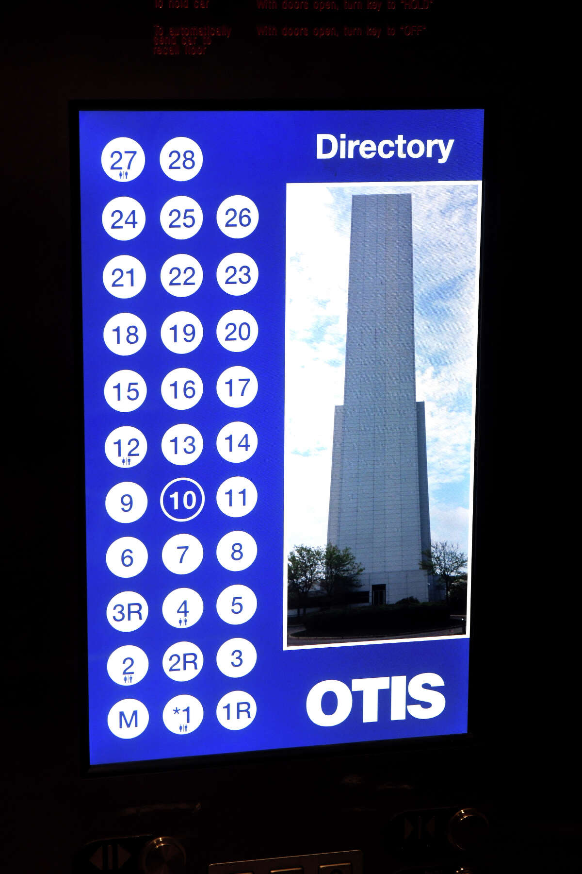 A digital floor selection display in an elevator running inside Otis Worldwide's elevator test tower, in Bristol, Conn. Otis announced the sale of its Russian business in July 2022. A team in the Yale School of Management gives the company an A grade for its response to the Russian invasion of Ukraine. 