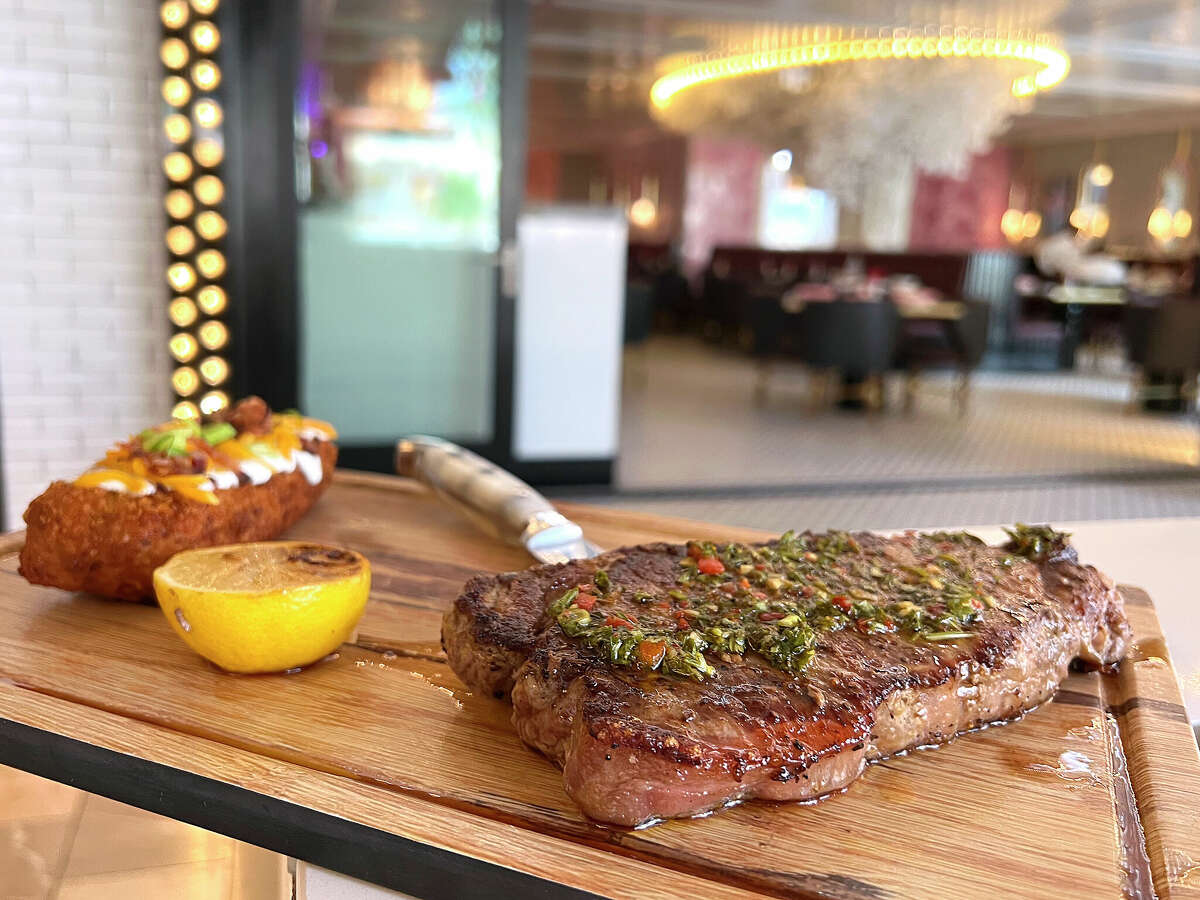 A 12-ounce New York Striploin comes with a loaded hashbrown at the Sugar Factory American Brasserie at The Shops at Rivercenter on the San Antonio River Walk. 