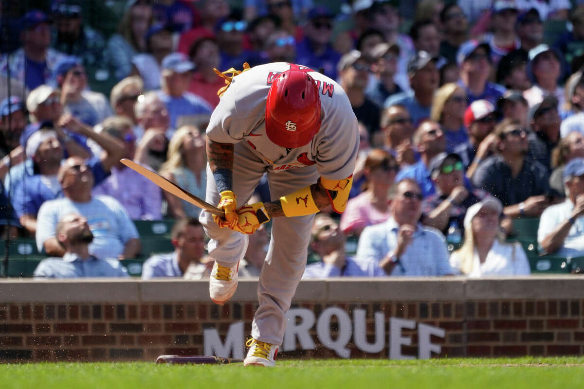 Cardinals score twice in 8th to defeat Cubs