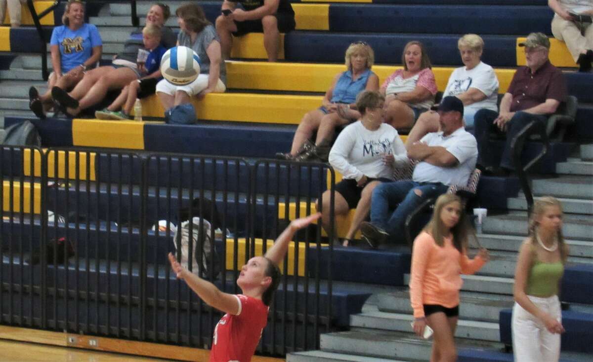 Benzie Central senior Autumn Wallington serves during a match against Manistee on Aug. 23 at Manistee High School