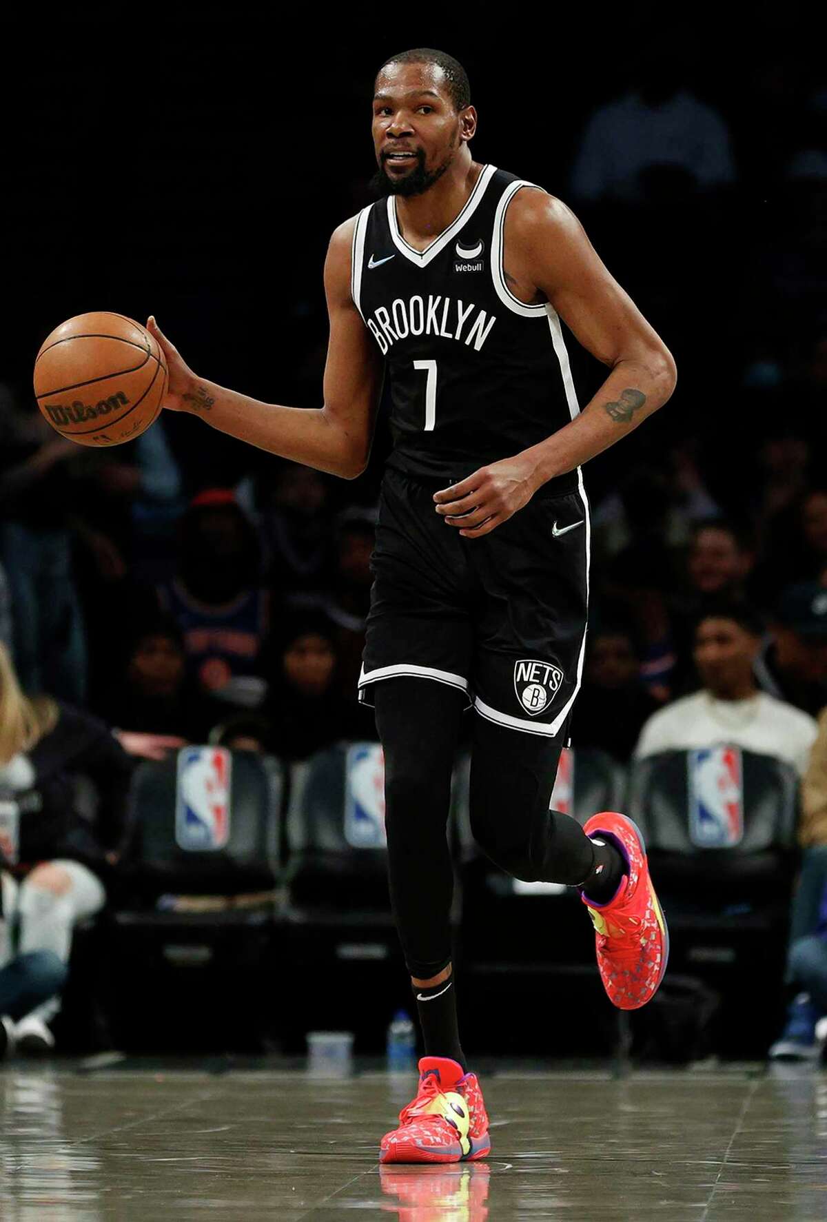 Nets forward Kevin Durant dribbles during the first half against the New York Knicks at Barclays Center on March 13. He averaged 29.9 points, 7.4 rebounds and 6.4 assists last season.