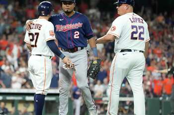 BALTIMORE, MD - August 10: Houston Astros second baseman Jose Altuve (27)  points skyward after scoring during the Houston Astros versus the Baltimore  Orioles on August 10, 2023 at Oriole Park at